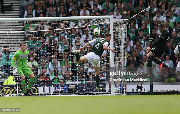 Gary Hooper of Celtic scores the second goal during the William Hill Scottish Cup Final match between Celtic and Hibernian at Hampden Stadium on May...
