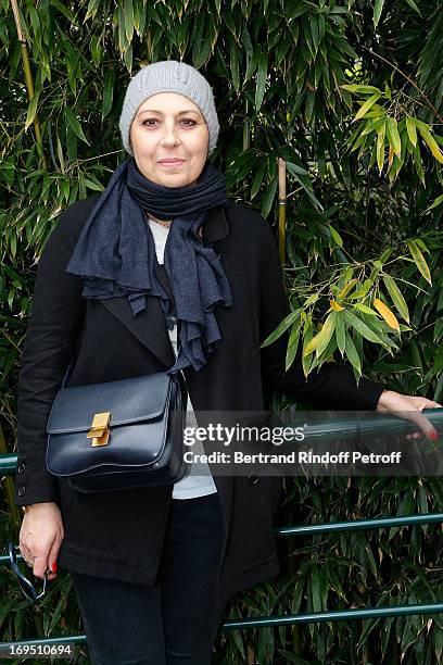 Actresse Valerie Benguigui attends Roland Garros Tennis French Open 2013 - Day 1 on May 26, 2013 in Paris, France.