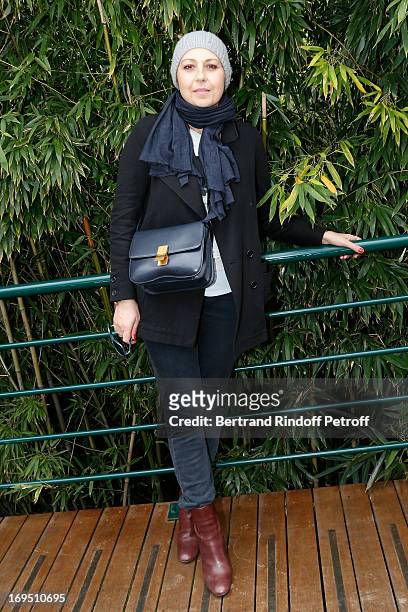 Actresse Valerie Benguigui attends Roland Garros Tennis French Open 2013 - Day 1 on May 26, 2013 in Paris, France.
