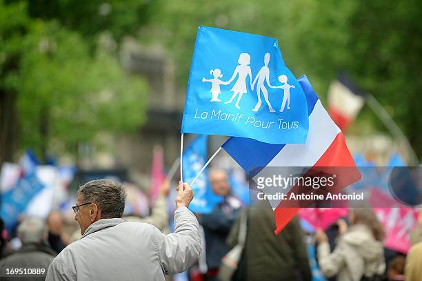 Anti-same sex marriage activists of the anti-gay marriage movement 'La Manif Pour Tous' protest during a demonstration on May 26, 2013 in Paris,...