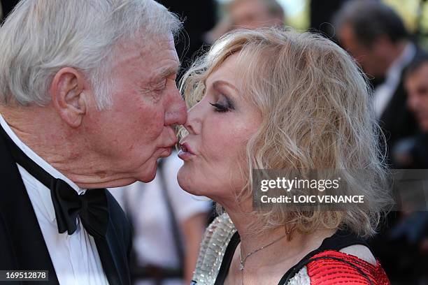 Actress Kim Novak kisses her husband Robert Malloy as they arrive on May 26, 2013 for the screening of the film "Zulu" presented Out of Competition...