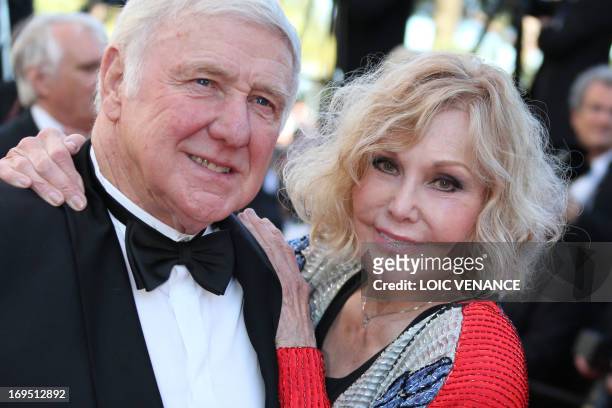 Actress Kim Novak and her husband Robert Malloy pose on May 26, 2013 as they arrive for the screening of the film "Zulu" presented Out of Competition...