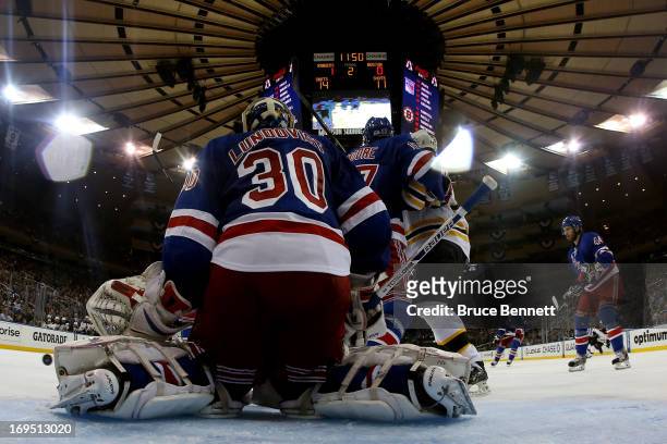 Henrik Lundqvist of the New York Rangers tends goal against the Boston Bruins in Game Three of the Eastern Conference Semifinals during the 2013 NHL...