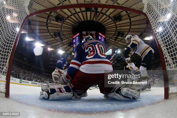 Henrik Lundqvist of the New York Rangers tends goal against the Boston Bruins in Game Three of the Eastern Conference Semifinals during the 2013 NHL...