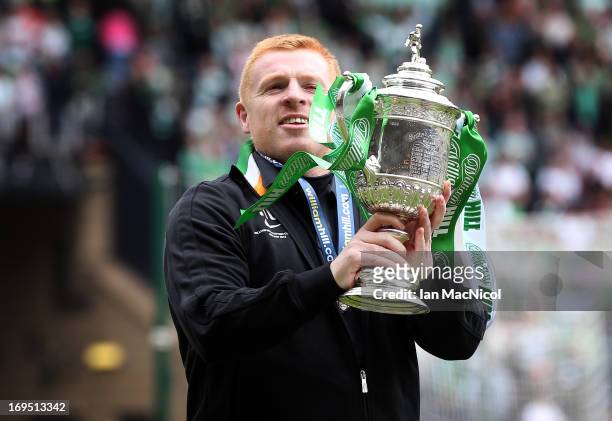 Celtic manager Neil Lennon celebrates with the Scottish Cup after winning the William Hill Scottish Cup Final match between Celtic and Hibernian at...