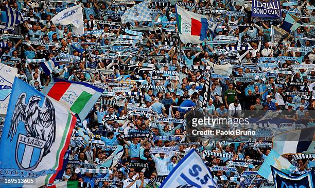 Lazio fans support their team during the TIM cup final match between AS Roma v SS Lazio at Stadio Olimpico on May 26, 2013 in Rome, Italy.
