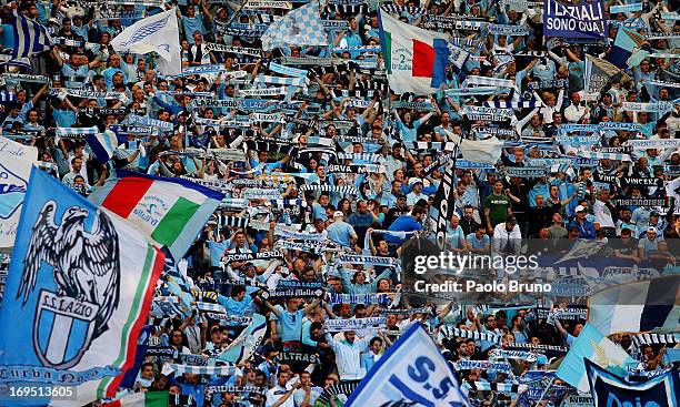 Lazio fans support their team during the TIM cup final match between AS Roma v SS Lazio at Stadio Olimpico on May 26, 2013 in Rome, Italy.