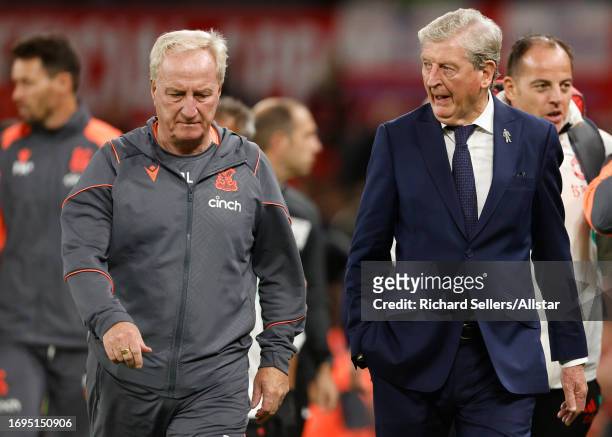Roy Hodgson, manager of Crystal Palace and Ray Lewington, first team coach during the Carabao Cup Third Round match between Manchester United and...