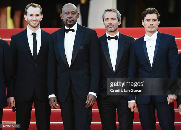 Actors Conrad Kemp and Forest Whitaker, director Jerome Salle and actor Orlando Bloom attend the 'Zulu' Premiere and Closing Ceremony during the 66th...