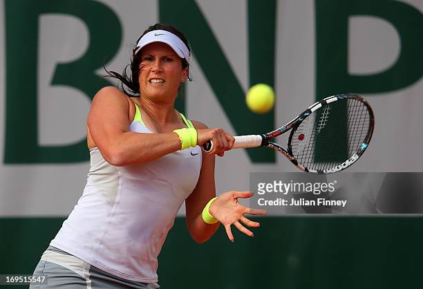 Sofia Arvidsson of Sweden plays a backhand in her Women's Singles match against Sabine Lisicki of Germany during day one of the French Open at Roland...