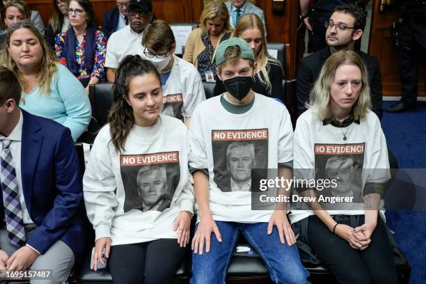 Demonstrators wear shits with the picture of Chairman of the House Oversight Committee James Comer on them during a Committee hearing titled "The...