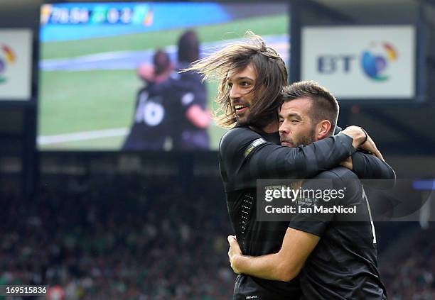 Joe Ledley celebrates with team-mate Georgios Samaras of Celtic after scoring a goal during the William Hill Scottish Cup Final match between Celtic...