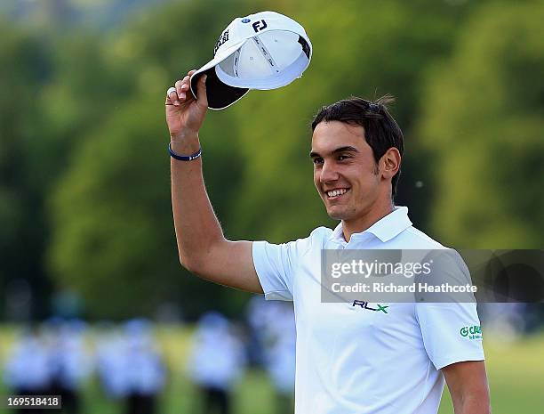 Matteo Manassero of Italy celebrates victory on the eighteenth green after the fourth play-off hole during the final round of the BMW PGA...