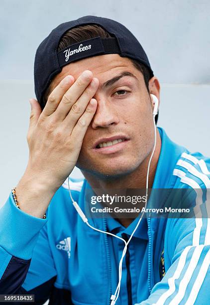 Cristiano Ronaldo of Real Madrid CF reacts annoyed while listen to music with headphones prior to start the La Liga match between Real Sociedad de...