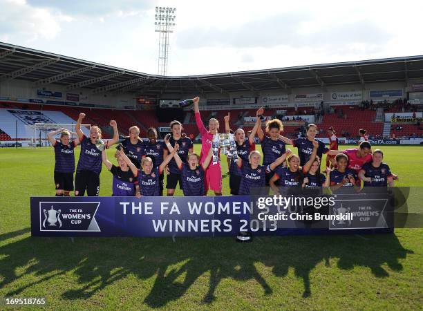 Arsenal Ladies FC players celebrate with the trophy after winning The FA Women's Cup Final match between Bristol Academy Women's FC and Arsenal...