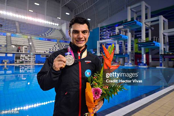 Yahel Castillo from Mexico poses during the Men's 3 meters Springboard Finals of the FINA MIDEA Diving World Series 2013 at Pan American Aquatic...