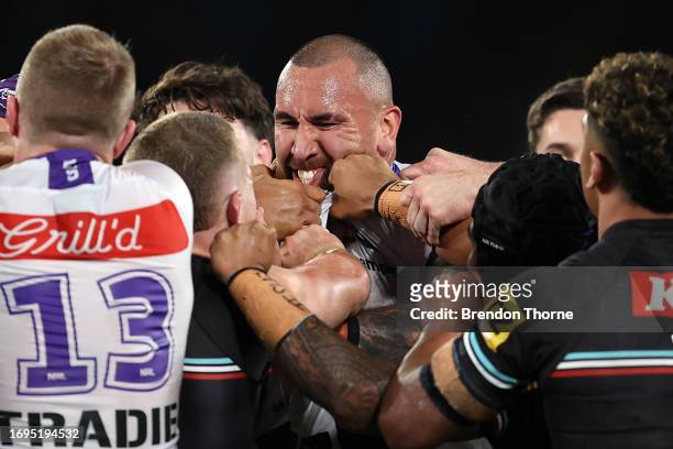 Nelson Asofa-Solomona of the Storm scuffles with Panthers players during the NRL Preliminary Final match between the Penrith Panthers and Melbourne...