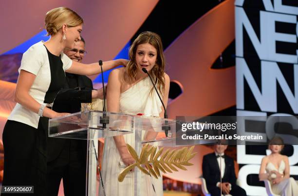 Actress Lea Seydoux, director Abdellatif Kechiche and actress Adele Exarchopoulos on stage after 'La Vie D'Adele' receives the 'Palme d'Or' at the...