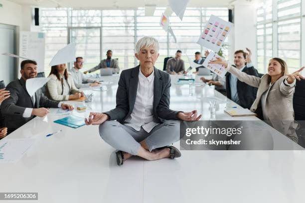 maintaining mental balance on the job! - office zen stock pictures, royalty-free photos & images