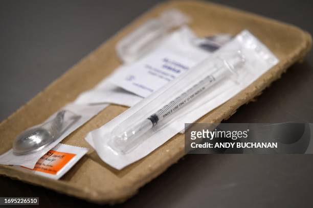 Drug taking paraphernalia are picture on a table in a cubicle inside the UK's first drug consumption room, where users can take their own illegal...