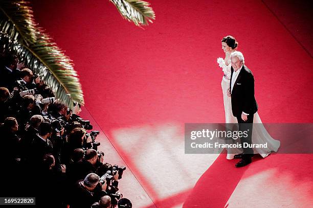 French actor Alain Delon and Marine Lorphelin attend the 'Zulu' Premiere and Closing Ceremony during the 66th Annual Cannes Film Festival at the...