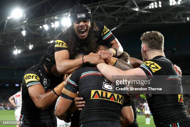 Brian To'o of the Panthers celebrates with team mates after scoring a try during the NRL Preliminary Final match between the Penrith Panthers and...
