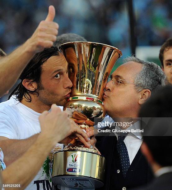 Stefano Mauri of Lazio and Claudio Lotito President of Lazio celebrate the victory after the TIM cup final match between AS Roma v SS Lazio at Stadio...