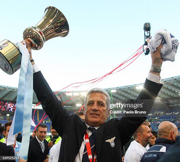 Lazio head coach Vladimir Petkovic celebrates with the trophy after winning the Tim cup final against AS Roma at Stadio Olimpico on May 26, 2013 in...