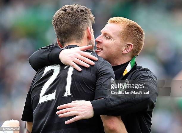 Celtic manager Neil Lennon hugs Charlie Mulgrew after the William Hill Scottish Cup Final match between Celtic and Hibernian at Hampden Stadium on...