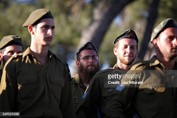 Ultra-Orthodox Israelis prepare prior to a military graduation ceremony on May 26, 2013 in Jerusalem, Israel. The Netzah Yehuda battalion was formed...