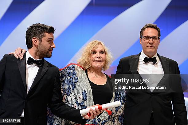Actress Kim Novak poses with actor Oscar Isaac after he received for directors Joel and Ethan Coen the Grand Prix award for 'Inside Llewyn Davis' on...