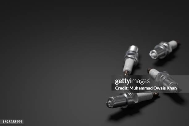 spark plug on black background - spark plug stock pictures, royalty-free photos & images