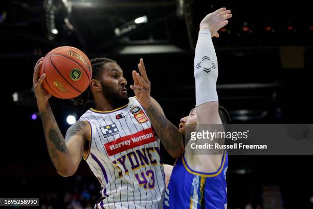 Jonah Bolden of the Kings is challenged by Aron Baynes of the Bullets during the 2023 NBL Blitz match between Sydney Kings and Brisbane Bullets at...