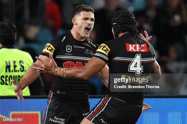 Nathan Cleary of the Panthers celebrates with team mates after scoring a try during the NRL Preliminary Final match between the Penrith Panthers and...