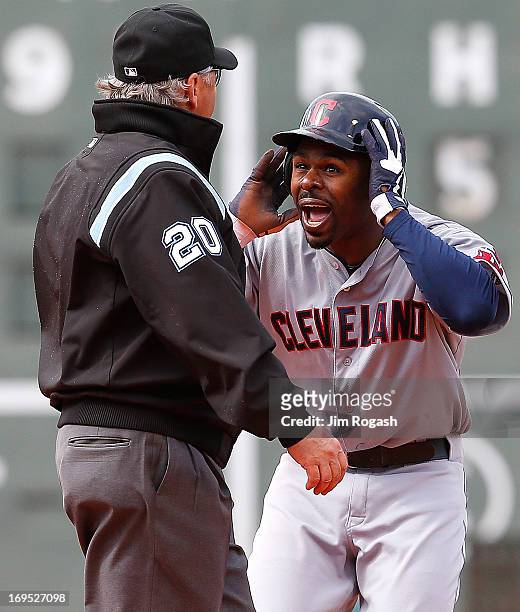 Michael Bourn of the Cleveland Indians pleads his case after umpire Tom Hallion called him on on a steal attempt against the Boston Red Sox in the...