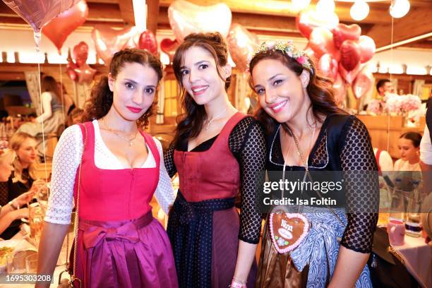 German actress Nadine Menz, German actress Jasmin Gassmann and German presenter Nina Moghaddam during the Madlwiesn at Oktoberfest at...