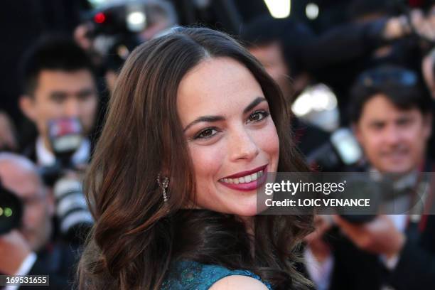 French actress Berenice Bejo poses on May 26, 2013 as she arrives for the screening of the film "Zulu" presented Out of Competition at the 66th...