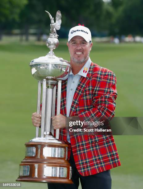 Boo Weekley poses with the trophy after his one-stroke victory at the Crowne Plaza Invitational at Colonial at Colonial Country Club on May 26, 2013...