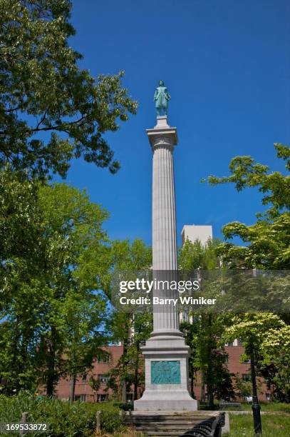 tall thin monument against trees and sky - riverdale stock pictures, royalty-free photos & images