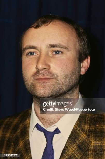 British singer and drummer Phil Collins of rock band Genesis during a charity concert at the National Exhibition Centre on March 2, 1984 in...