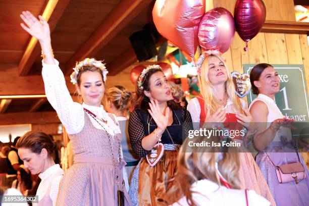 German actress Laura Osswald, German presenter Nina Moghaddam and German presenter Tina Kaiser during the Madlwiesn at Oktoberfest at...