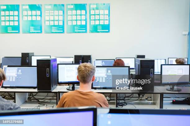 high school student learning coding - computer training stock pictures, royalty-free photos & images