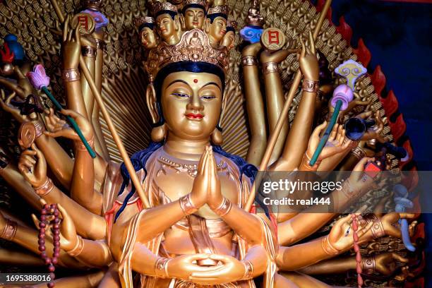 chinese buddha - chinese worship the god of fortune in guiyuan buddhist temple stockfoto's en -beelden