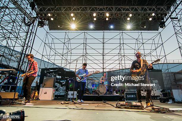 Musicians Mark Watrous, Yuuki Matthews, Joe Plummer and James Mercer of The Shins perform at Williamsburg Park on May 26, 2013 in Brooklyn, New York.