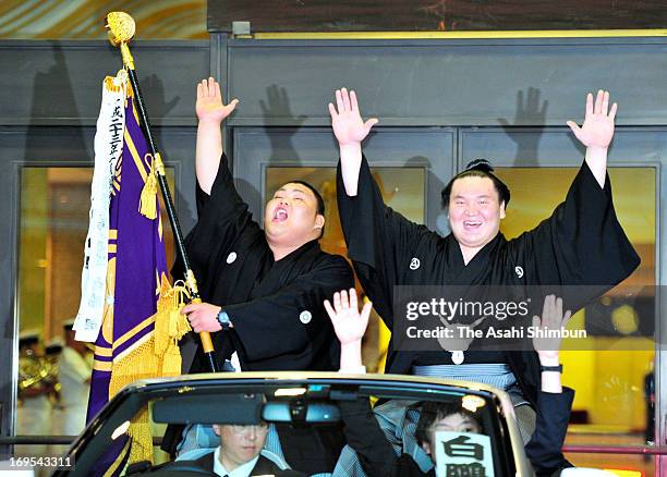 Mongolian Yokozuna, sumo's grand champion Hakuho , whose real name is Mnkhbatyn Davaajargal celebrates winning the Grand Sumo Summer Tournament...