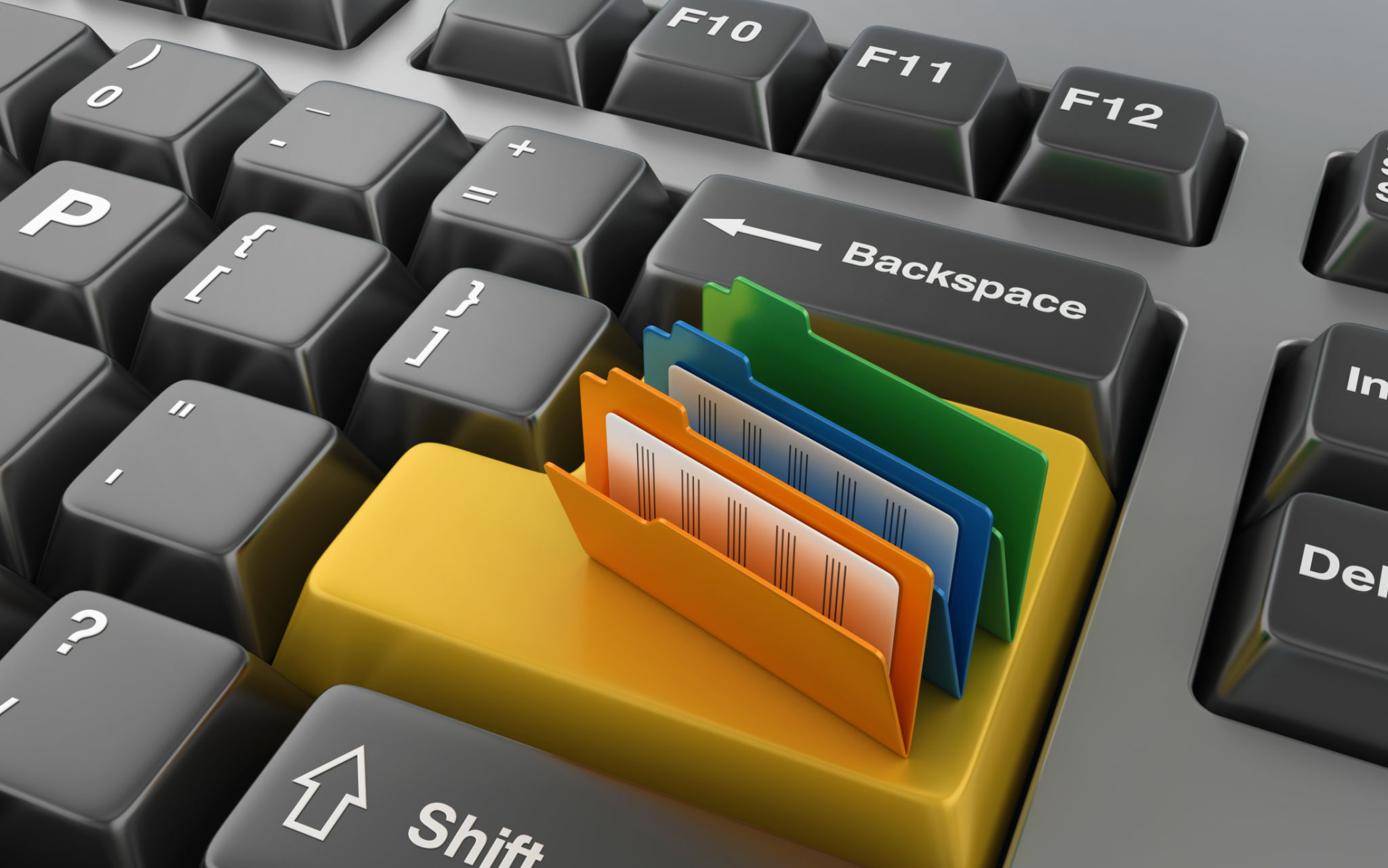 A computer keyboard with colorful digital folders scattered across it, representing the need for organisation and efficient document management. A computer keyboard with colorful digital folders scattered across it, representing the need for organisation and efficient document management.