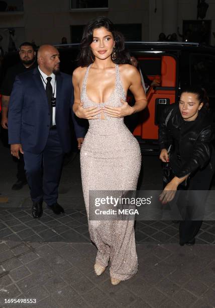 Kylie Jenner is seen arriving at the Schiaperelli Fashion held at the Italian Embassy on September 27, 2023 in Paris, France.