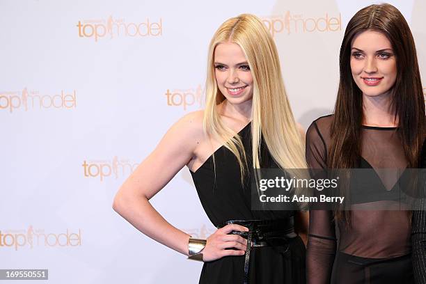 Contestants Sabrina Elsner and Luise Will pose at a photo call for the reality television show and modeling competition Germany's Next Topmodel at...