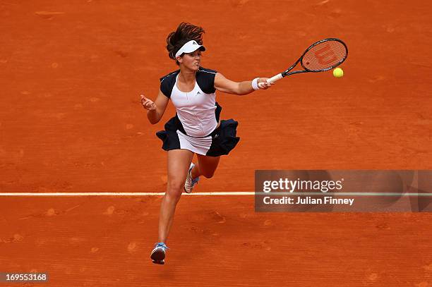 Laura Robson of Great Britain plays a forehand in her Women's Singles match against Caroline Wozniacki of Denmark during day two of the French Open...