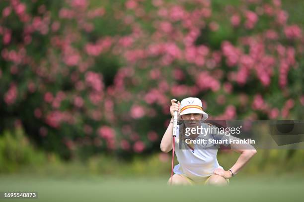 Madelene Sagstrom of Team Europe lines up a putt on the fourth green during Day One of The Solheim Cup at Finca Cortesin Golf Club on September 22,...